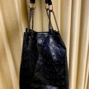 Woman’s black skull pattern tote bag/purse